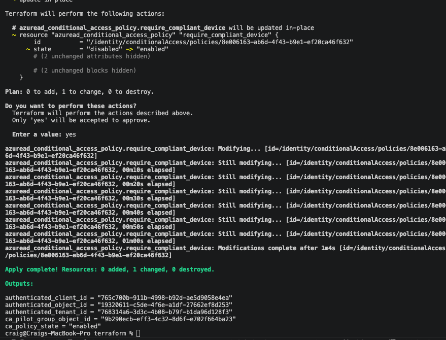 Terminal output showing terraform apply restoring the policy to enabled, confirmed in the output